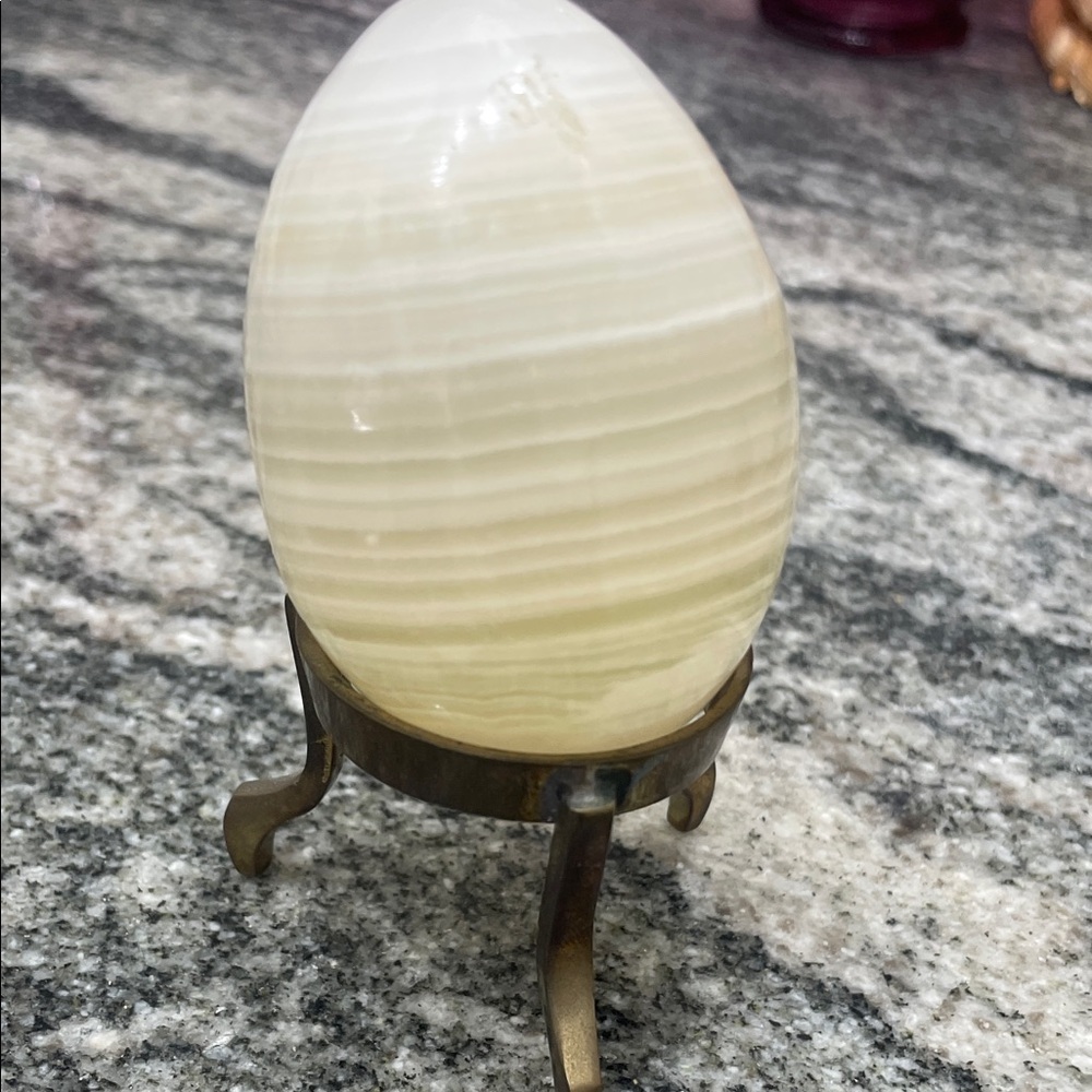Elegant Cream Stone Accent with Brass Stand